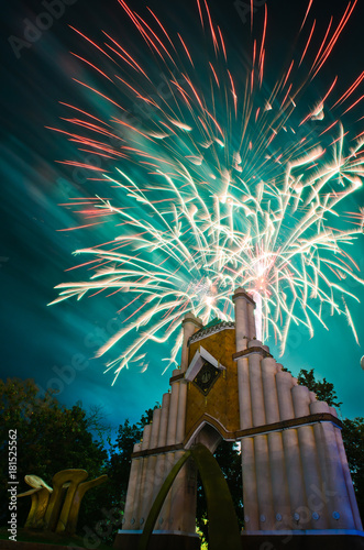 Clock Tower in Khonkean, Khon Kaen ,Thailand.have firework for background,Fireworks light up the sky,celebration photo