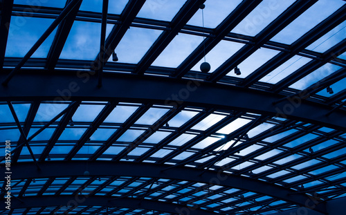 Glass Roof Against Blue Sky And Sun Shine