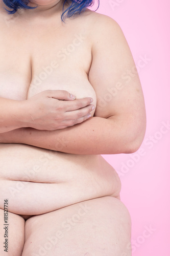 Wallpaper Mural Plus size model in front of pink background Torontodigital.ca