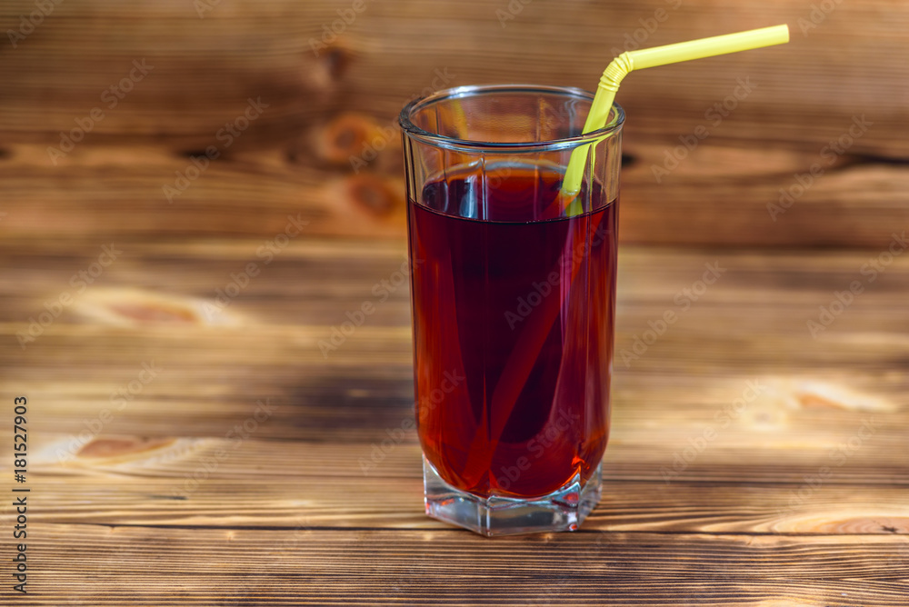 glass beaker with pomegranate juice wooden background glass beaker with pomegranate juice wooden background