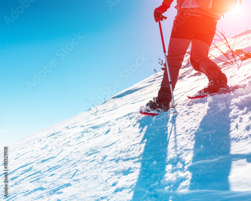Man in snowshoes. photo