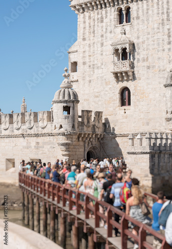 People standing in a queue to popular Belem tower.