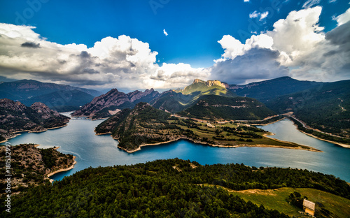 Wide angle view of mountains and lake