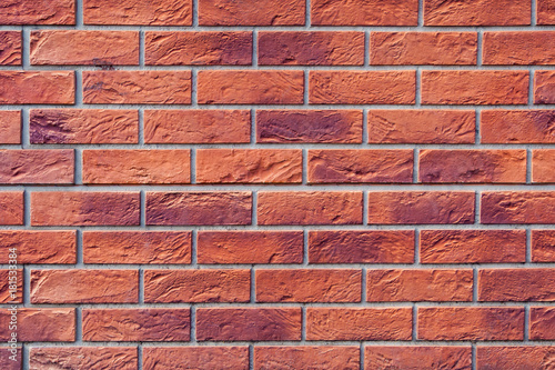 Wall of orange tile as brickwork (background, texture)