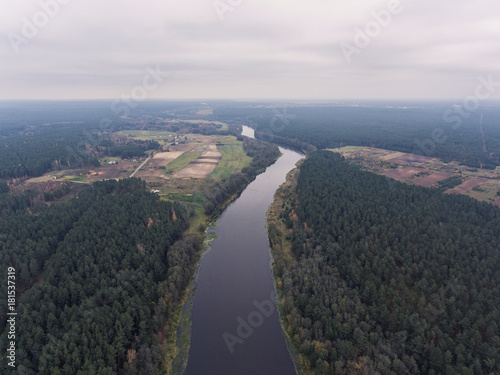 Aerial view over cloudy river Nemunas valley near border in Lithuania. photo