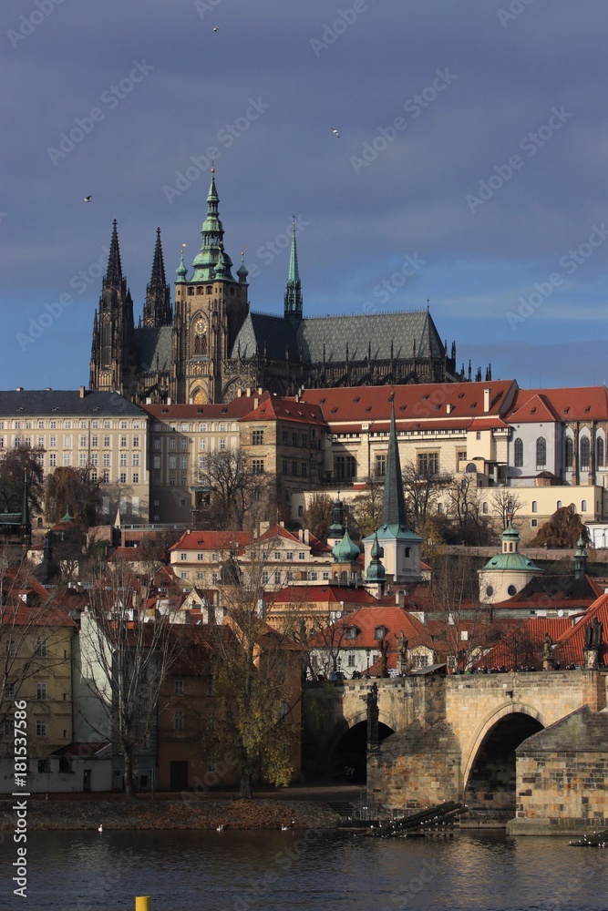 Fototapeta premium panoramic view over the Vlatave River, Charles Bridge and Prague Castle with the Cathedral Veitsdom