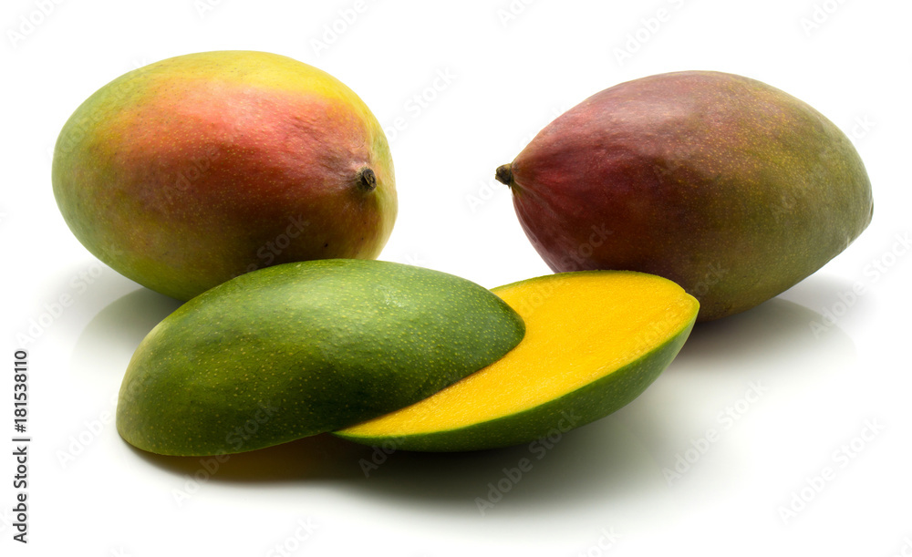 Mango isolated on white background two whole one sliced. Mango isolated on white background two whole one sliced.