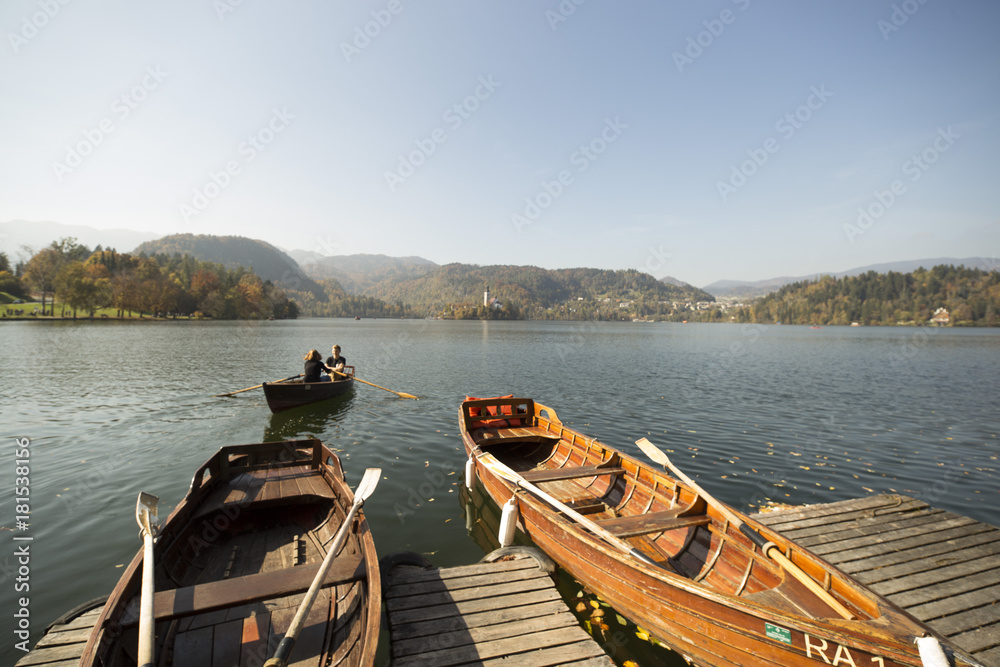 Couple boat riding sailing at lake Bled