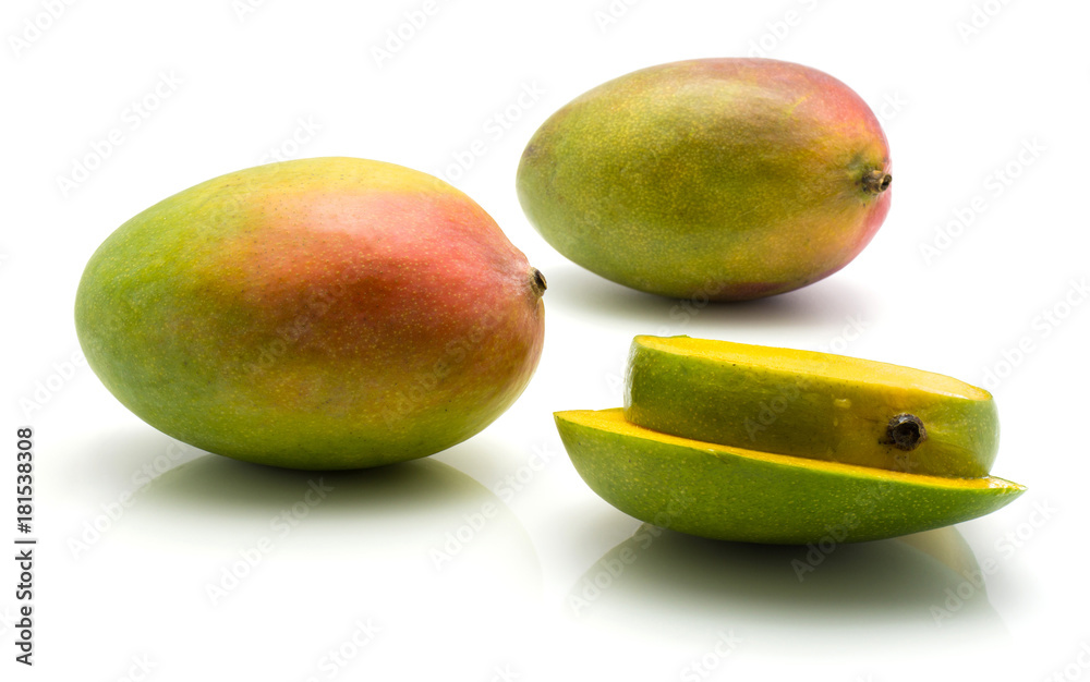 Sliced mango isolated on white background two whole two slices. Sliced mango isolated on white background two whole two slices.