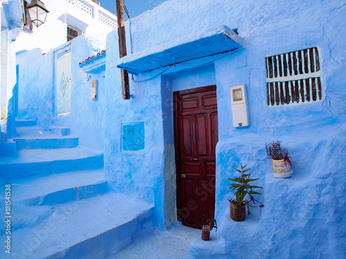 The gorgeous blue streets and blue-washed building of Chefchaouen the Moroccan blue city - amazing palette of blue and white buildings © Natalia Schuchardt