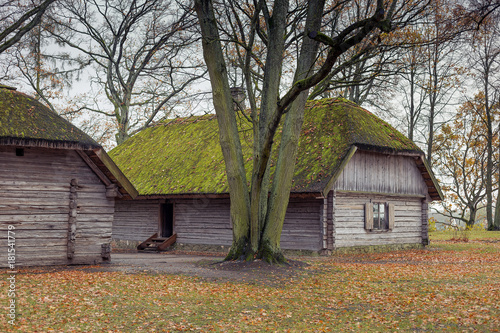 Old cottage, old wooden house, with moss