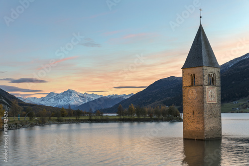 The submerged bell tower of Curon Venosta, province of Bolzano, Alto Adige district, Italy photo