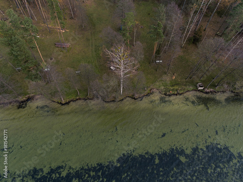 Aerial view over big lake Dusia in Lithuania, during cloudy Autumn day. photo