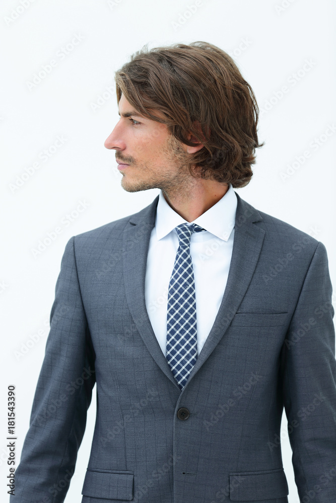Handsome young business man looking away. Handsome young business man looking away.