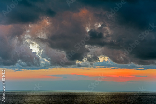 Evening clouds over the Ligurian coast, Italy photo