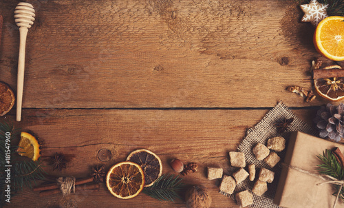 Ingredients for mulled wine on wooden board