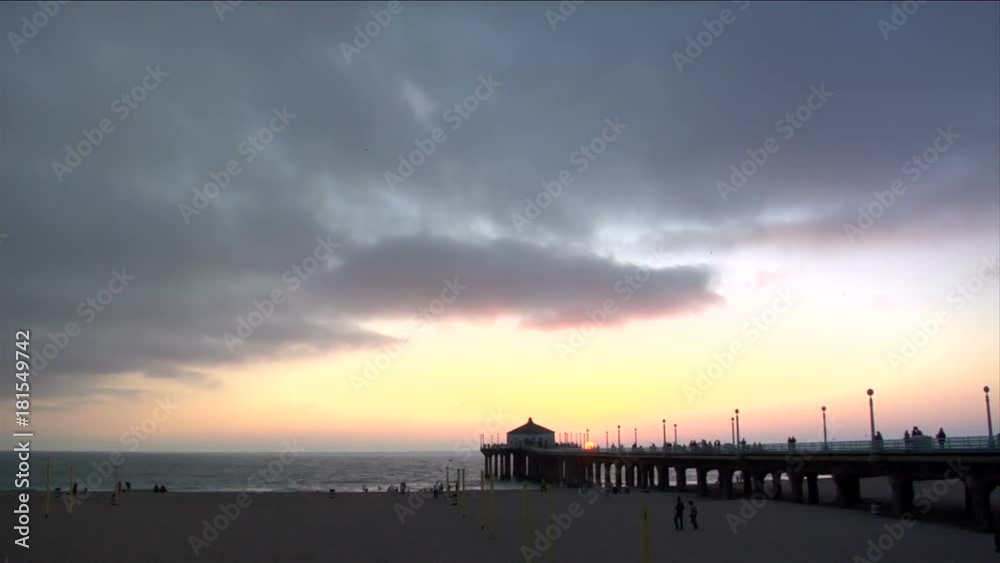 Wide, scenic timelapse over beach pier Wide, scenic timelapse over beach pier