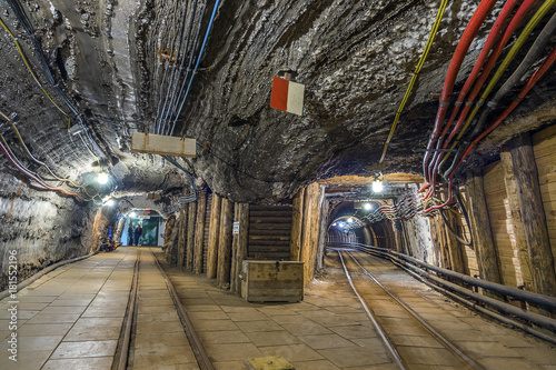 Принти на полотні Two illuminated underground tunnels in old mine
