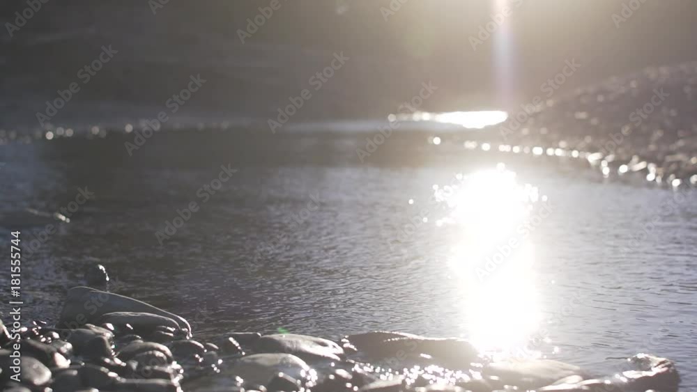 Slow motion, skipping rocks on pond Slow motion, skipping rocks on pond
