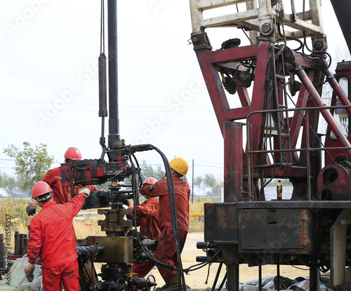 Oil workers are working at the oil fields