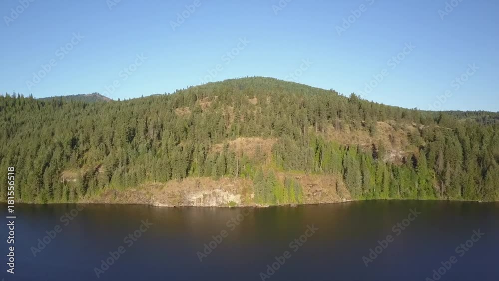 Aerial pull back view to beautiful mountain lake in Idaho at daytime Aerial pull back view to beautiful mountain lake in Idaho at daytime