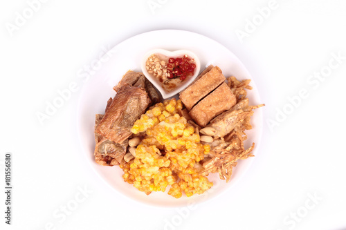 Deep fried dessert of sweet corn,tofu ,taro and spring roll served with spicy sweet sauce.