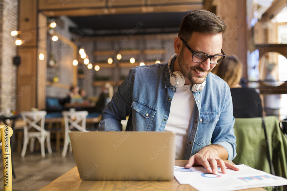 Fototapeta premium Freelancer at the coffee shop