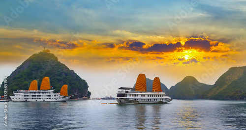 Tourist junks floating Ha Long Bay, South China Sea Vietnam photo