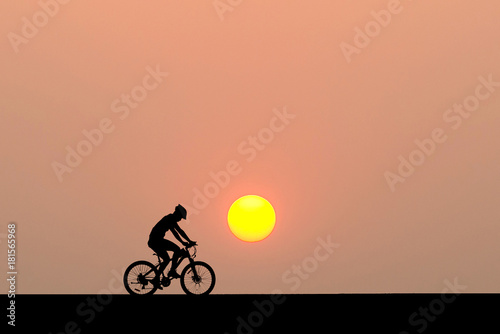 Wallpaper Mural Silhouette of cyclist motion on sunset background Torontodigital.ca