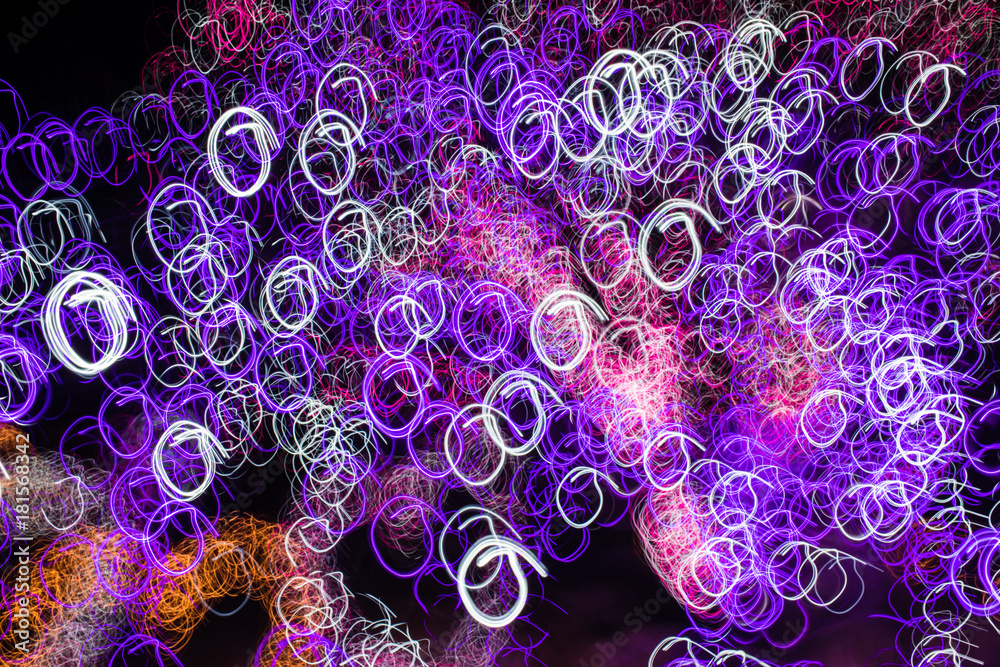 Shake the camera at numerous lights at night to create an abstract-looking night surface. Shake the camera at numerous lights at night to create an abstract-looking night surface.