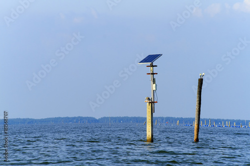 solar panel set in the middle of the sea. © nitimongkolchai