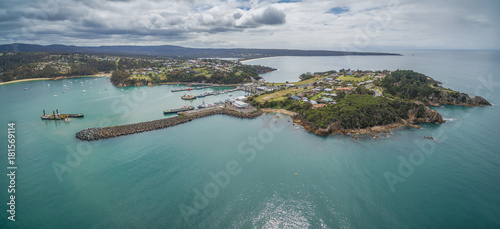 Aerial panorama of the lookout point where people watch for whales and wharf in Eden, NSW, Australia