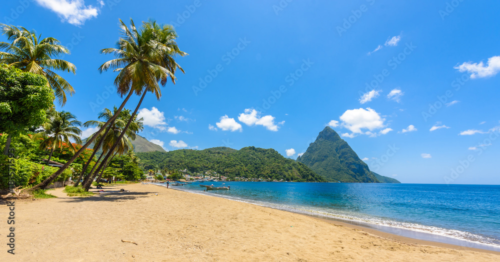 Fototapeta premium Paradise beach at Soufriere Bay with view to Piton at small town Soufriere in Saint Lucia, Tropical Caribbean Island.