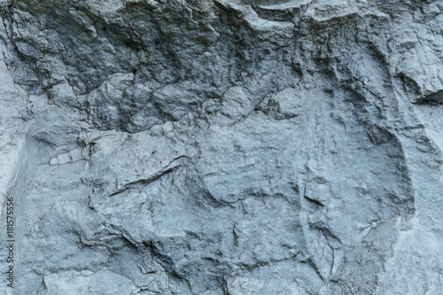 Aged gray stone macro, granite texture closeup