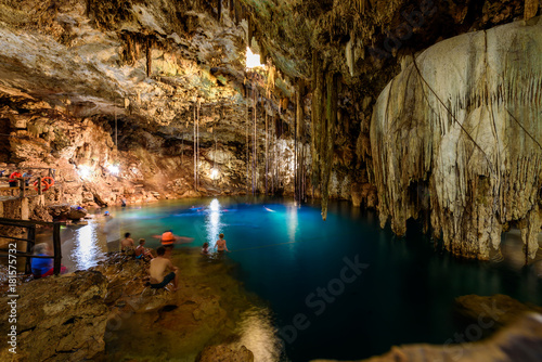 Crystal blue water in Cenote XKeken (XQuequen) in Dzitnup village near Valladolid city - Yucatan Peninsula - Mexico photo