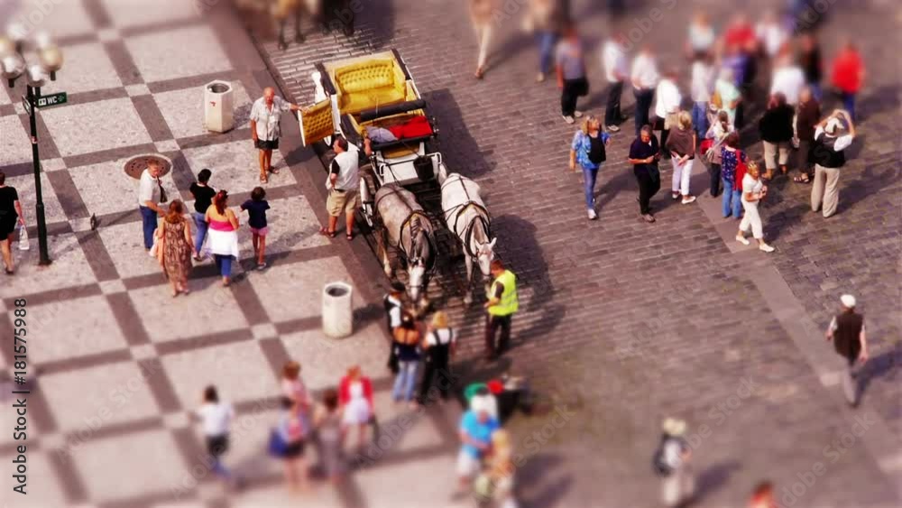 Miniature people getting into Horse Carriage at Old Town Square in Prague (tilt-shift) Miniature people getting into Horse Carriage at Old Town Square in Prague (tilt-shift)