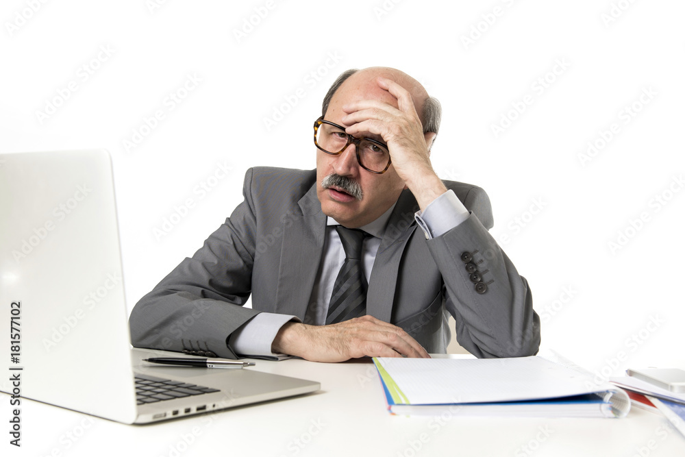mature business man with bald head on his 60s working stressed and frustrated at office computer laptop desk looking tired mature business man with bald head on his 60s working stressed and frustrated at office computer laptop desk looking tired