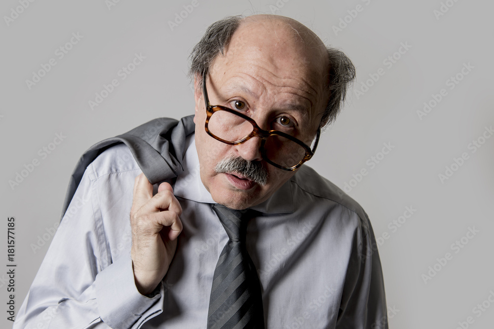 close up head portrait of bald 60s senior business man sad and depressed looking funny and messy in sadness emotion close up head portrait of bald 60s senior business man sad and depressed looking funny and messy in sadness emotion