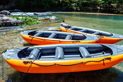 inflatable boat to transport tourists in Martvili canyon in Georgia. Beautiful natural canyon with view of the mountain river © photoaliona