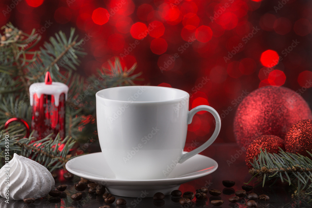 white cup of coffee in festive decoration, Christmas toys, red bokeh background, sweet dessert