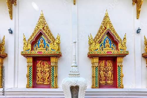 close up windows bass-relief in Beautiful temple Wat Samai Kongka on Ko Pha Ngan, Thailand. photo