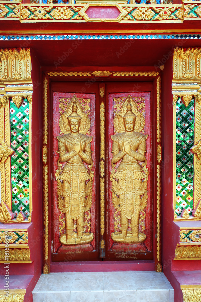 close up doors bass-relief in Beautiful temple Wat Samai Kongka on Ko Pha Ngan, Thailand.