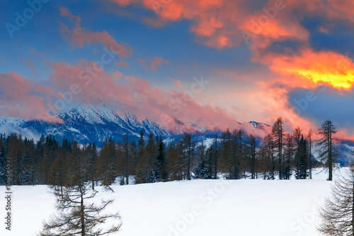 A beautiful sunset in the Alps. Winter mountain landscape.