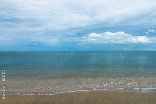 Quiet sea with blue sky.