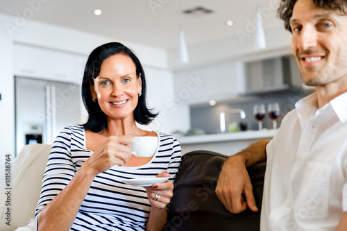 Portrait of a couple having tea at home