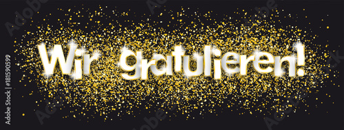 Wir Gratulieren auf goldenem Sand und schwarzem Hintergrund