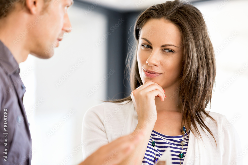 Image of two young business people in office Image of two young business people in office