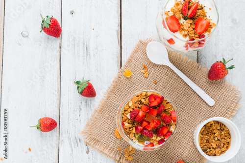 Strawberry , granola and yogurt healthy breakfast parfait