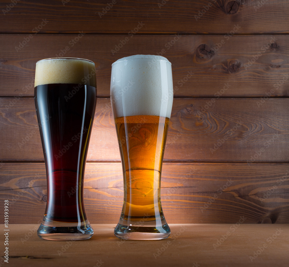 Two glasses of different colored beer