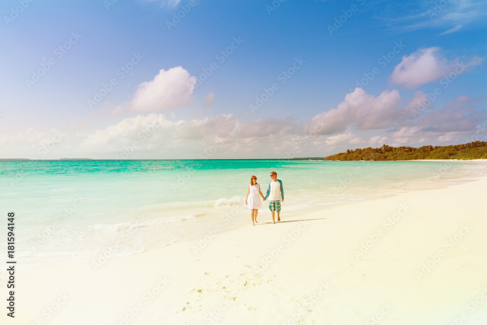 happy loving couple enjoy tropical beach